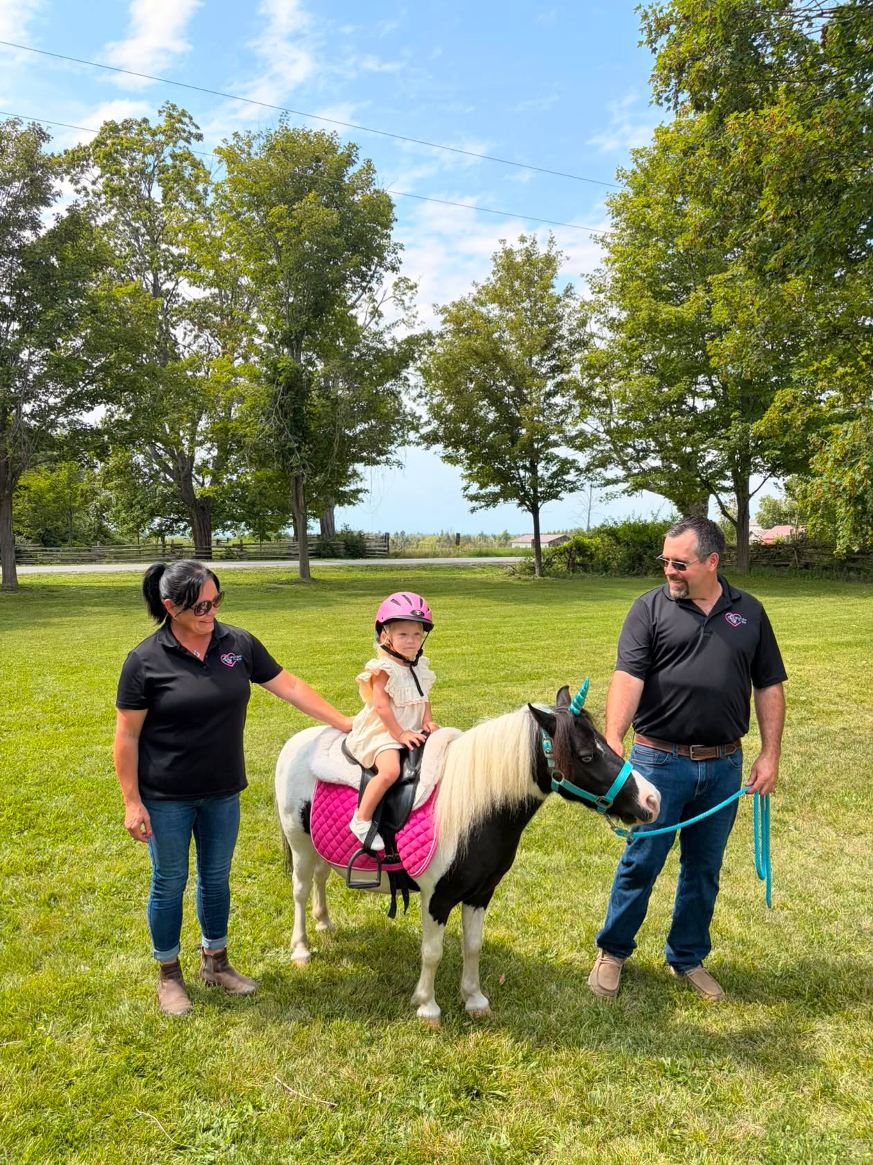 Lead-line pony ride with parents at a party