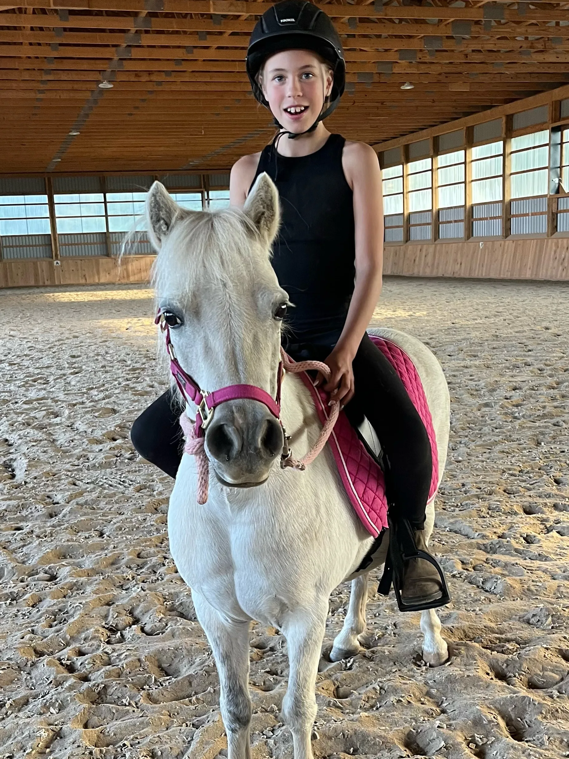 Parent and child during a 6-week pony program session